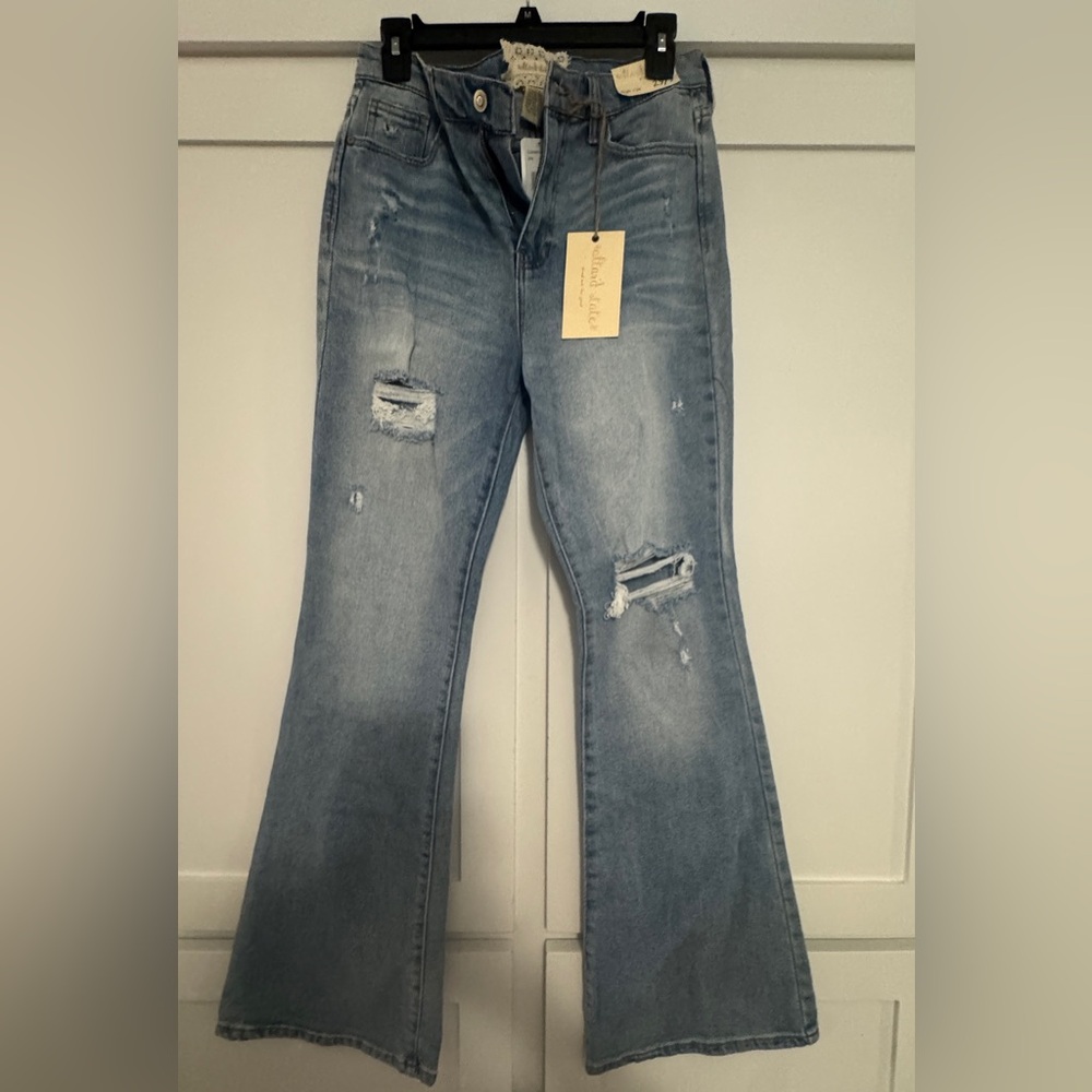 Distressed Blue Jeans